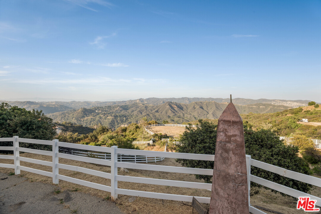 20333 Reigate Road Topanga, CA 90290 - Photo 18 of 21 a view of a city from a balcony