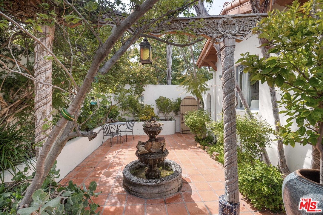 20333 Reigate Road Topanga, CA 90290 - Photo 4 of 21 a view of a fountain in the backyard of a house