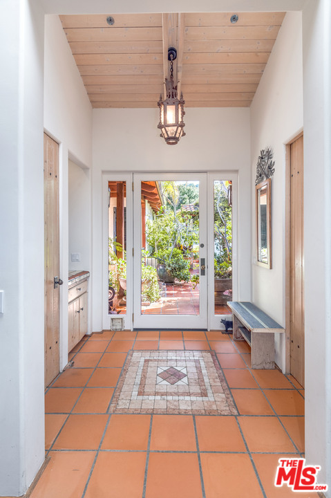 20333 Reigate Road Topanga, CA 90290 - Photo 6 of 21 a view of an empty room with a window