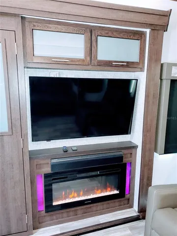 a stove top oven sitting inside of a kitchen