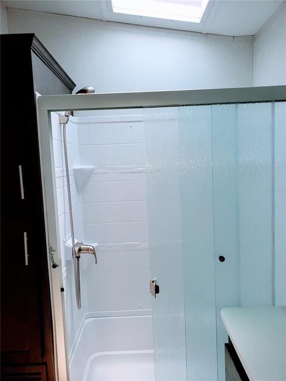 3000 Clarcona Road, Unit 2710 Apopka, FL 32703 - Photo 14 of 30 a bathroom with a shower