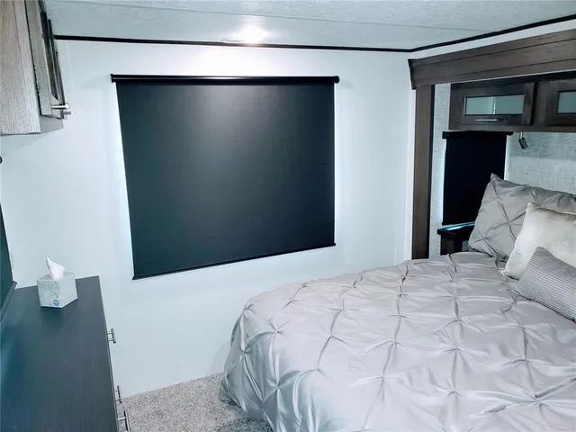 a bedroom with a bed