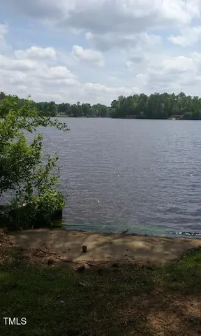 a view of a lake from a yard