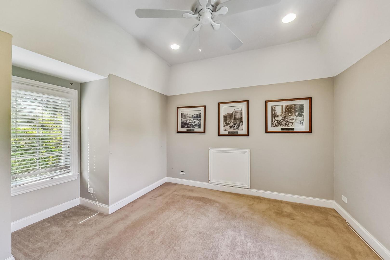 105 Fuller Road Hinsdale, IL 60521 - Photo 36 of 57 a view of an empty room with a window