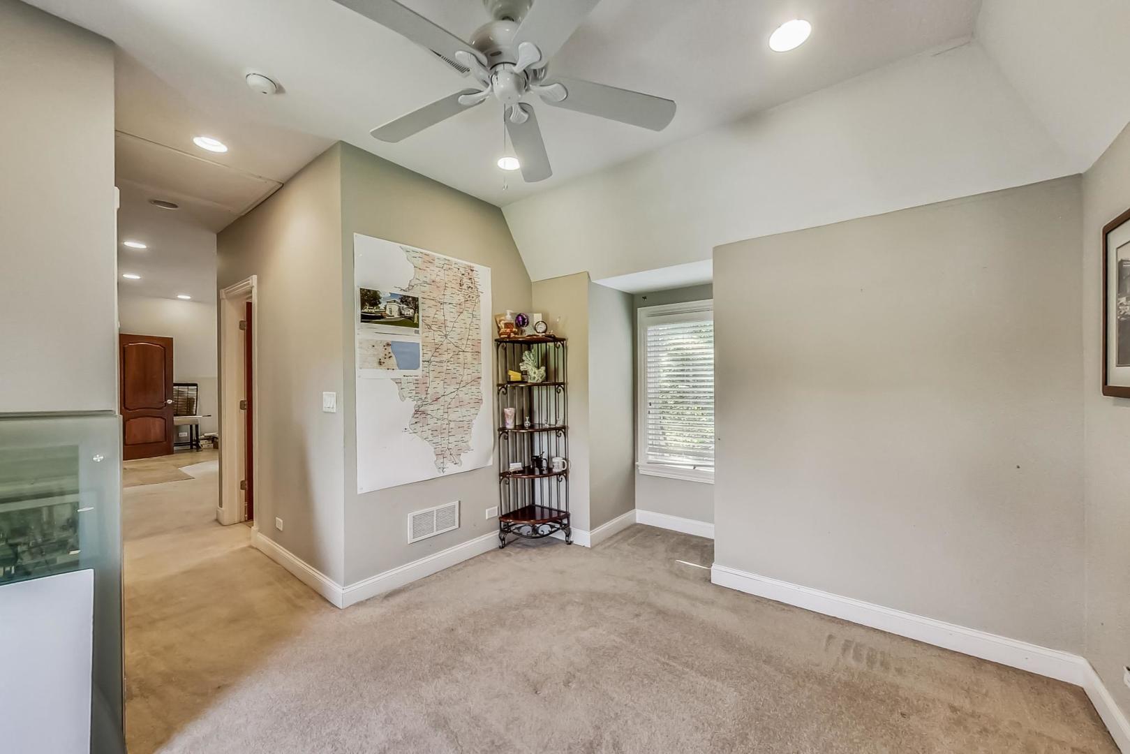 105 Fuller Road Hinsdale, IL 60521 - Photo 37 of 57 wooden floor in an empty room with a bathroom