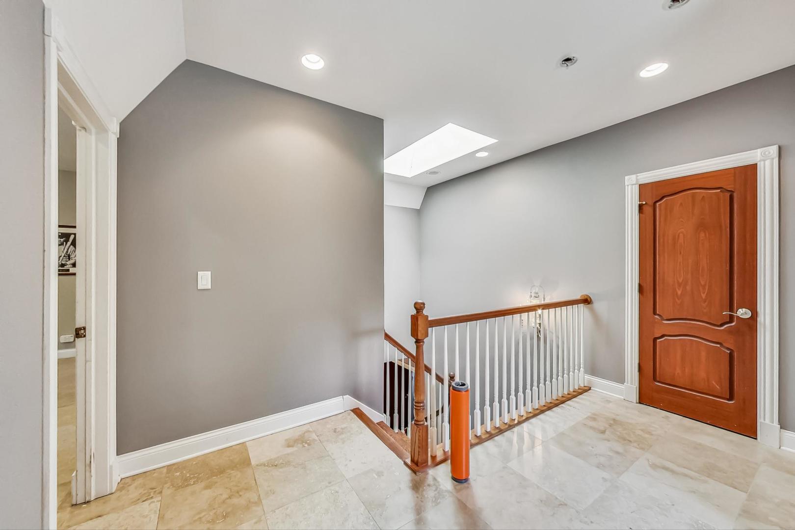 105 Fuller Road Hinsdale, IL 60521 - Photo 42 of 57 a view of a hallway with a door