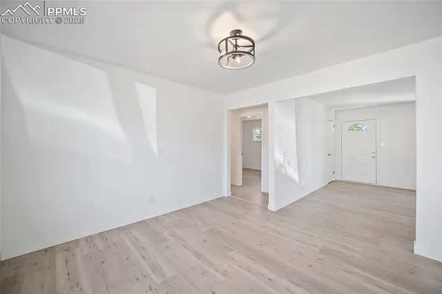 a view of a livingroom with wooden floor