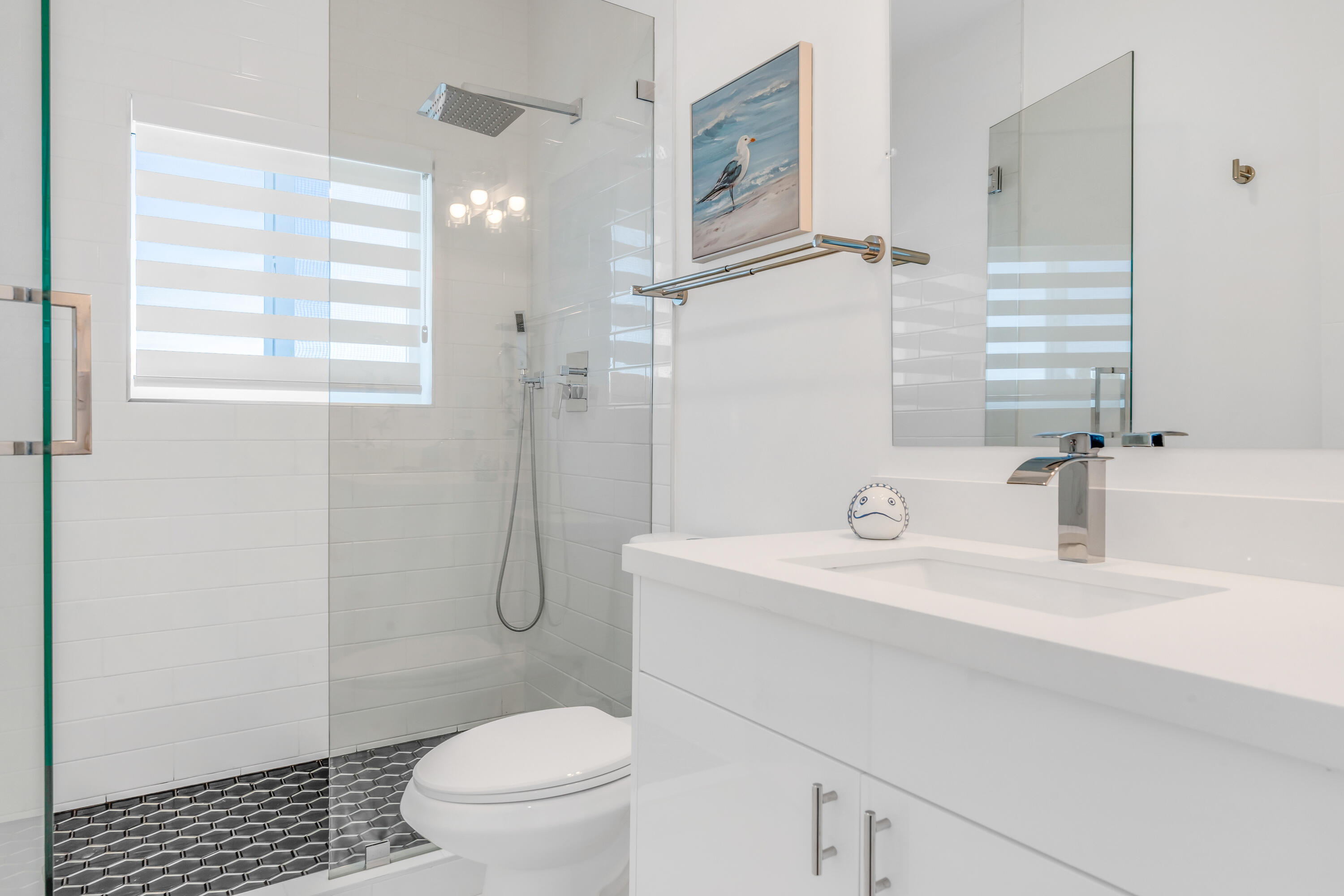 229 Upper Matecumbe Road Key Largo, FL 33037 - Photo 34 of 77 a bathroom with a sink a toilet and shower