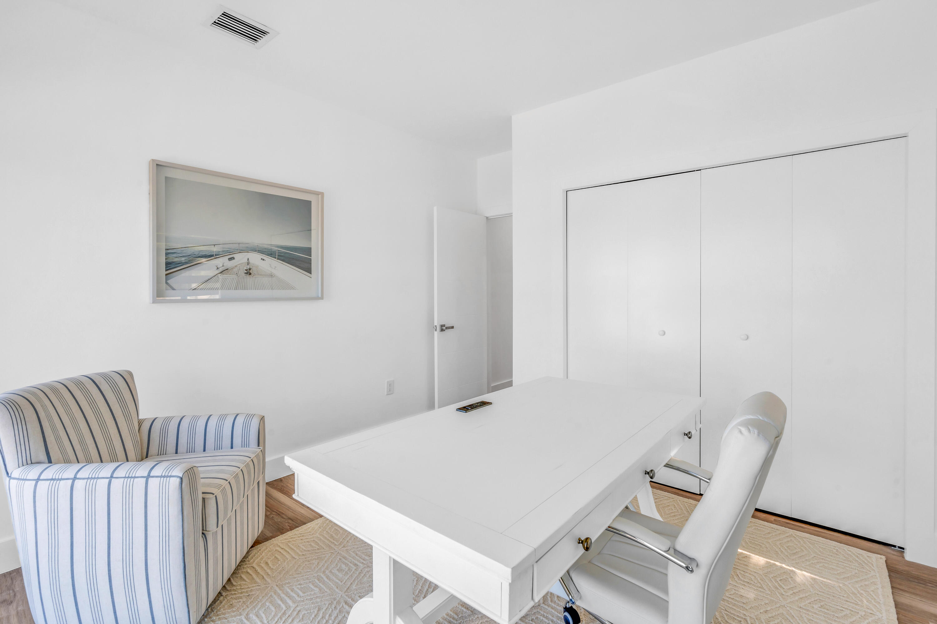 229 Upper Matecumbe Road Key Largo, FL 33037 - Photo 37 of 77 a view of a room with furniture and wooden floor