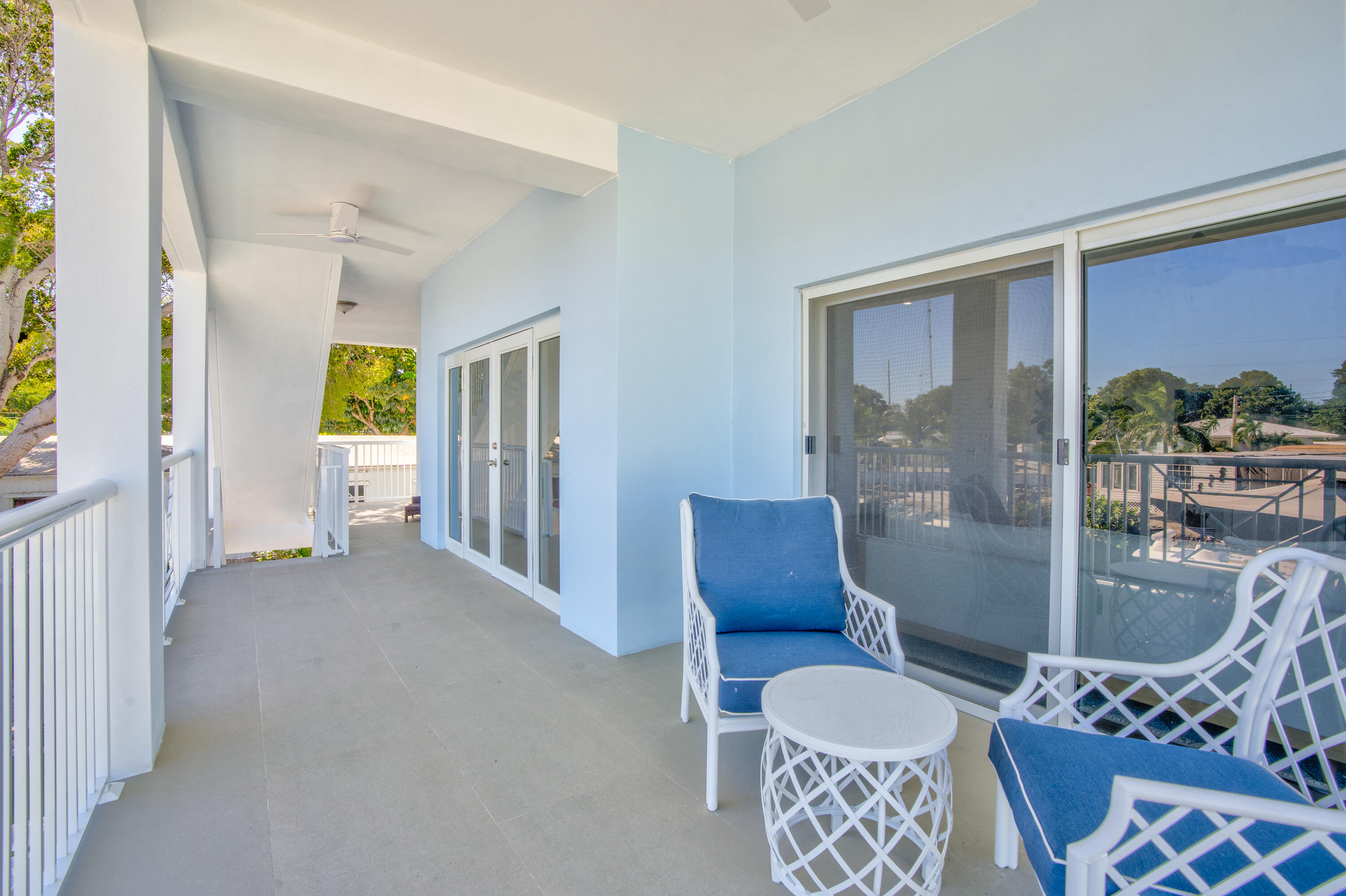229 Upper Matecumbe Road Key Largo, FL 33037 - Photo 52 of 77 a view of a livingroom with furniture and windows