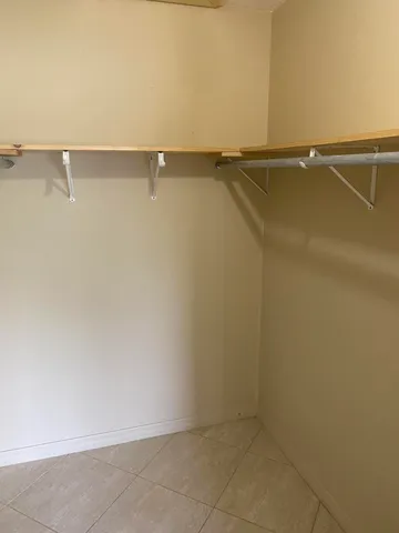 a view of a room with racks on the wall