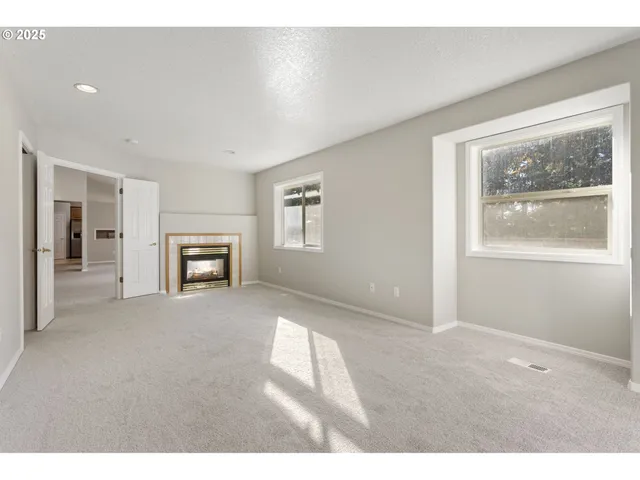 a view of an empty room with window