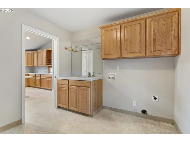 a kitchen that has a sink and a window