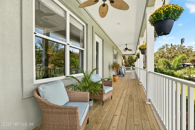 a view of a yard with a table and chairs