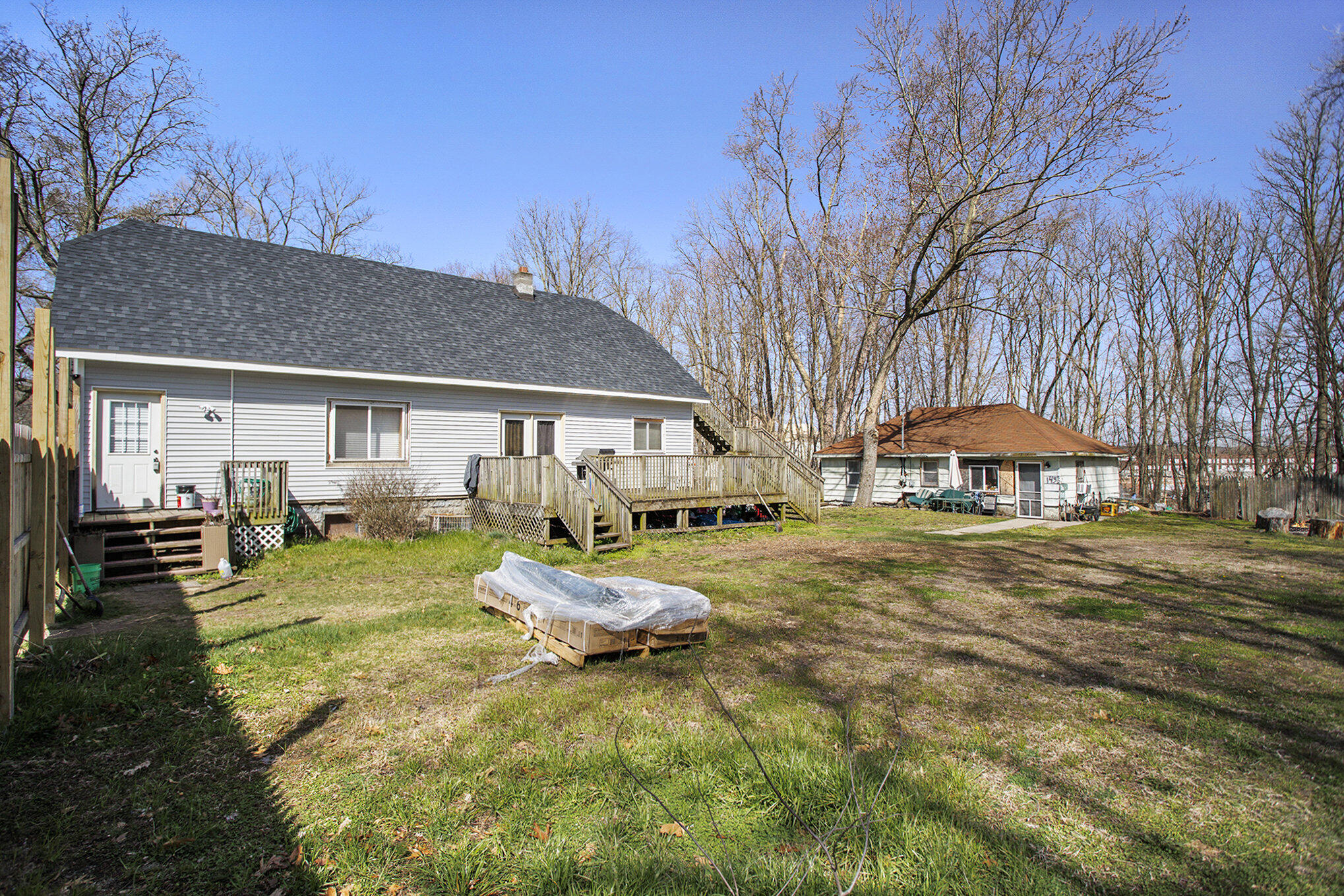 143 Rook Street Battle Creek, MI 49014 - Photo 24 of 26 Fenced in Yard and Deck