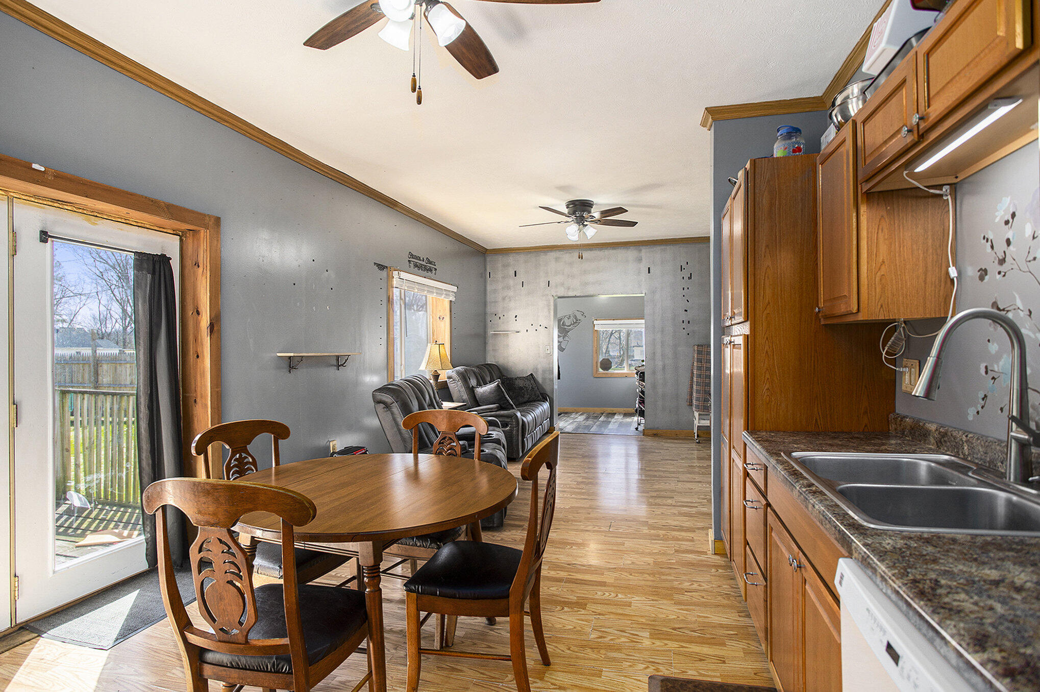 143 Rook Street Battle Creek, MI 49014 - Photo 9 of 26 Kitchen to Living Room