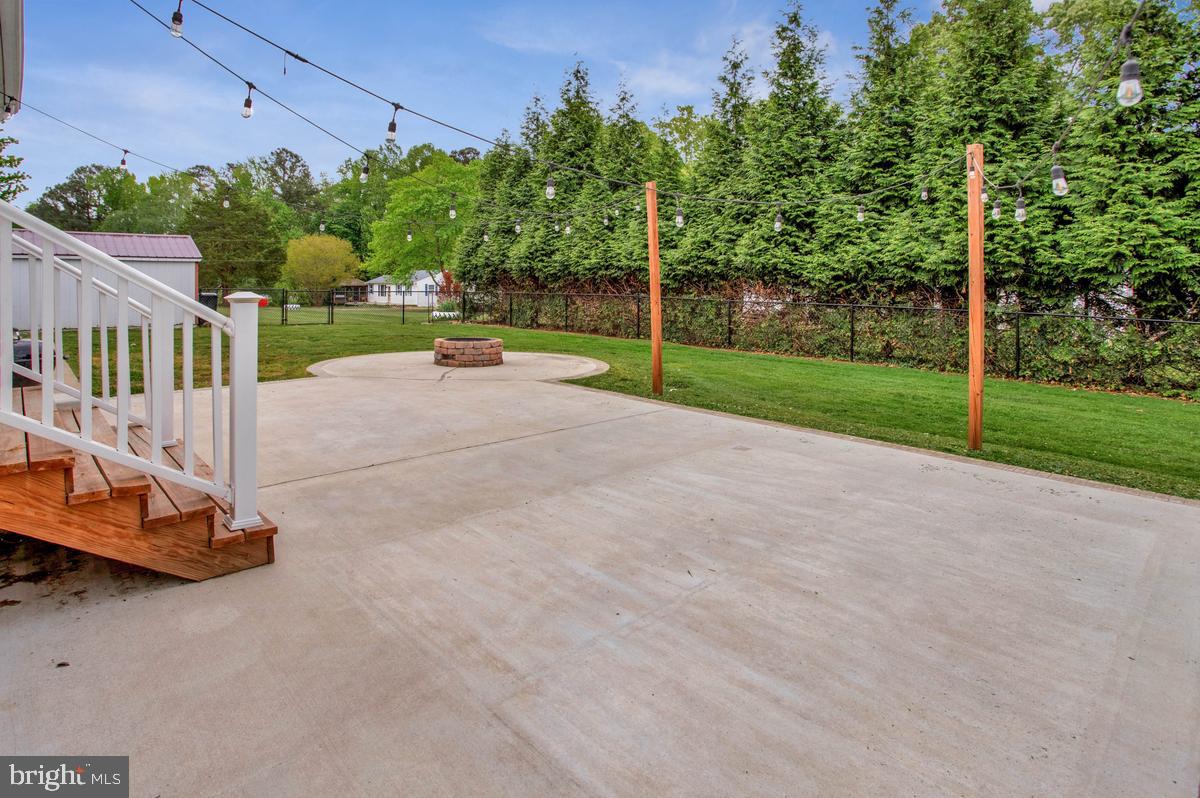 40295 Busy Corner Road Leonardtown, MD 20650 - Photo 28 of 34 Spacious patio with serene greenery.