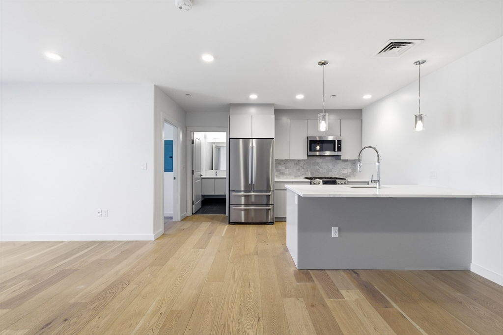 16 Boardman Street, Unit 202 Boston, MA 02128 - Photo 2 of 23