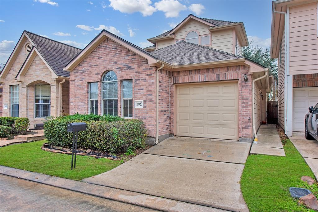 18923 Crescent Fountain Road Spring, TX 77388 - Photo 2 of 27 1 car garage and driveway in front for 2nd car
