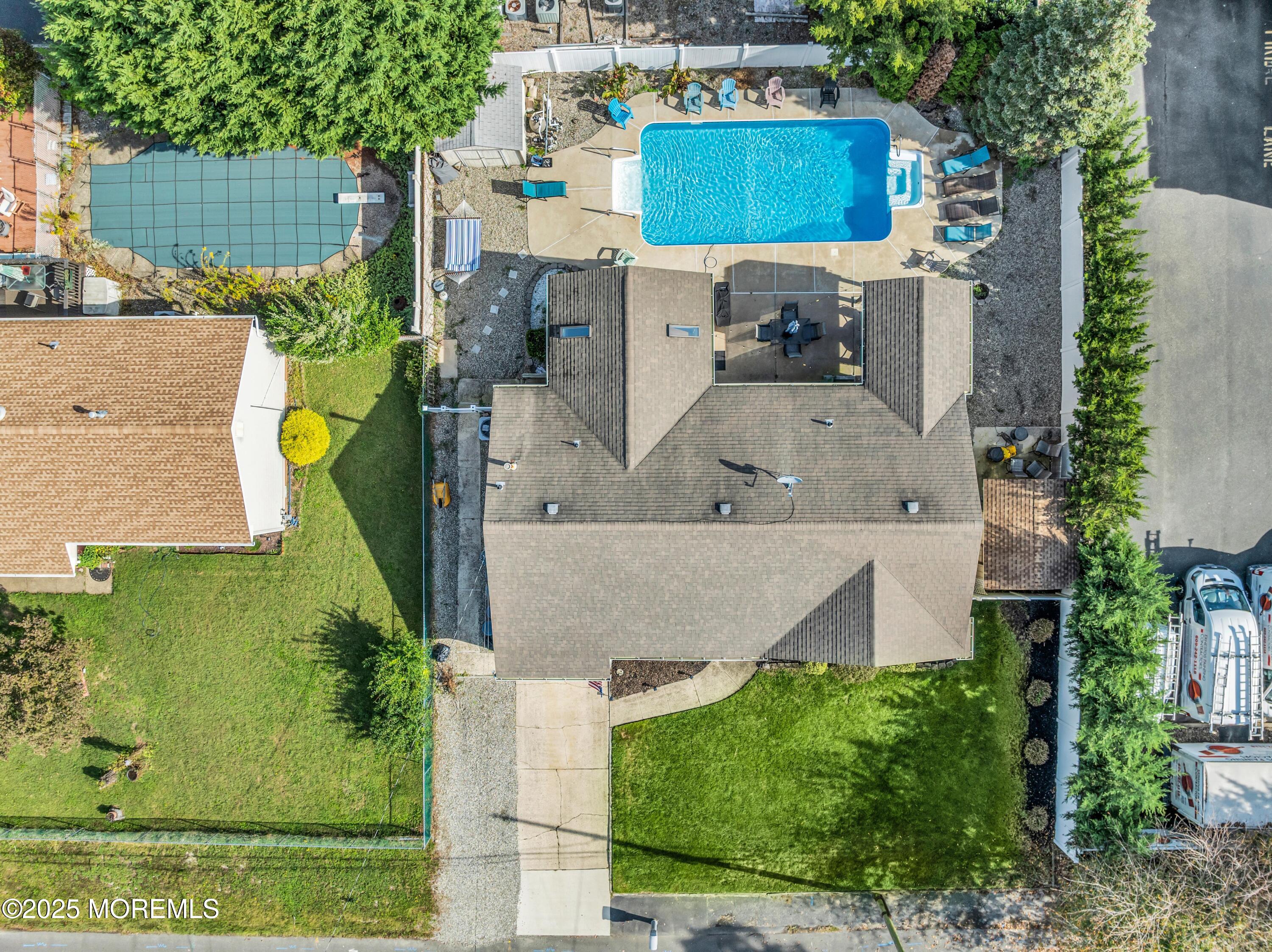 910 Alpine Street Forked River, NJ 08731 - Photo 20 of 32 an aerial view of a house with a swimming pool