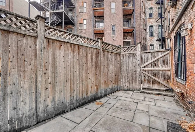 a city street lined with tall buildings