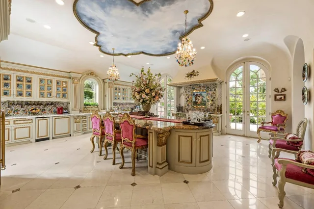 a bedroom with a bed mirror and window