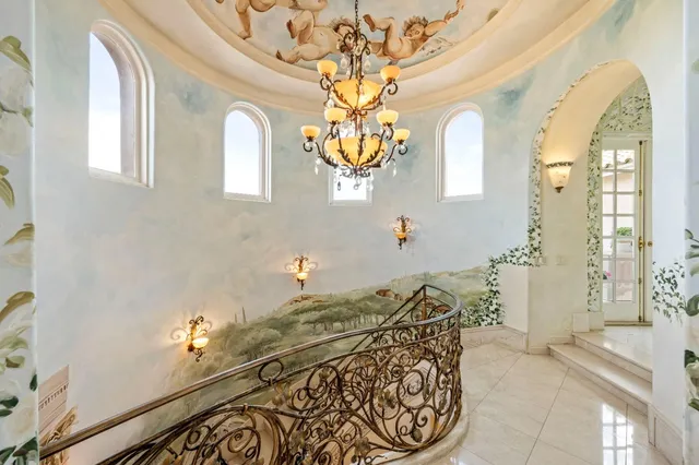 a projector room with furniture or couch and a flat screen tv