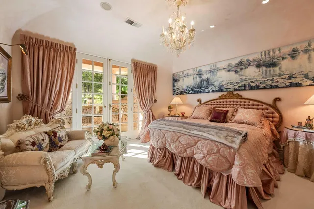 a bathroom with a sink a mirror and vanity