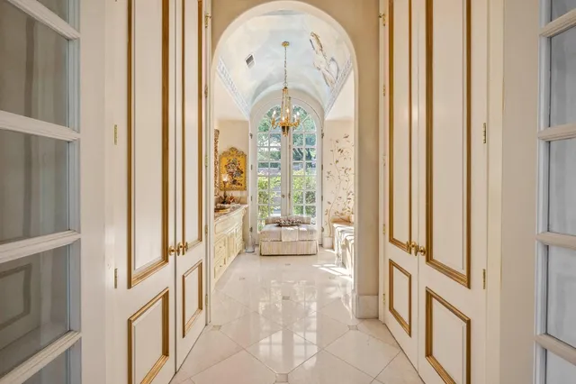 a living room filled with furniture and a rug
