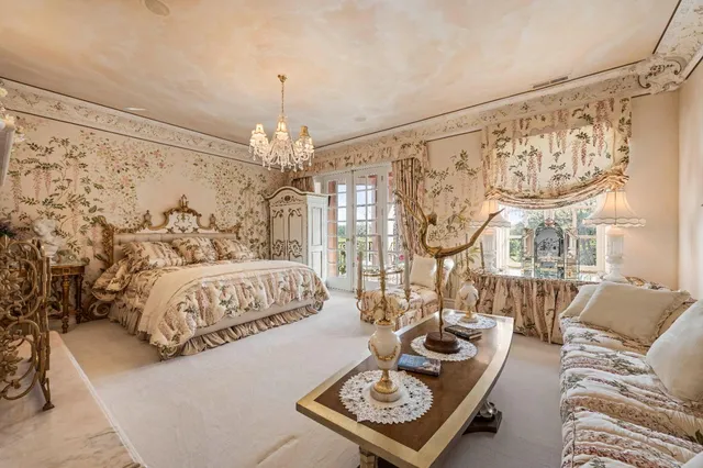 a kitchen with stainless steel appliances granite countertop a stove and a refrigerator