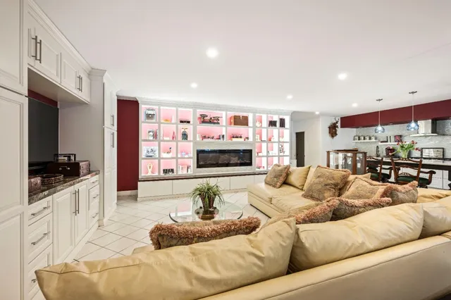 a view of a backyard with sitting area