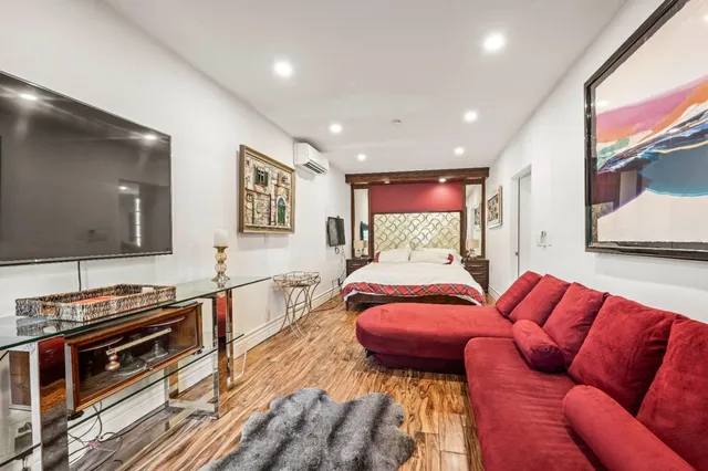 a view of a garden with a wooden fence