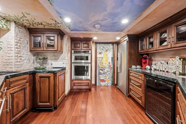 a backyard of a house with yard and outdoor seating