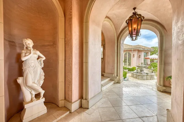 an aerial view of a house with a garden