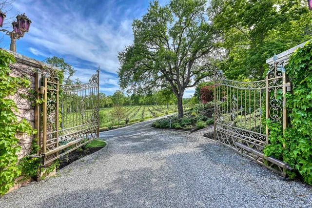 a kitchen with stainless steel appliances granite countertop a stove and a refrigerator