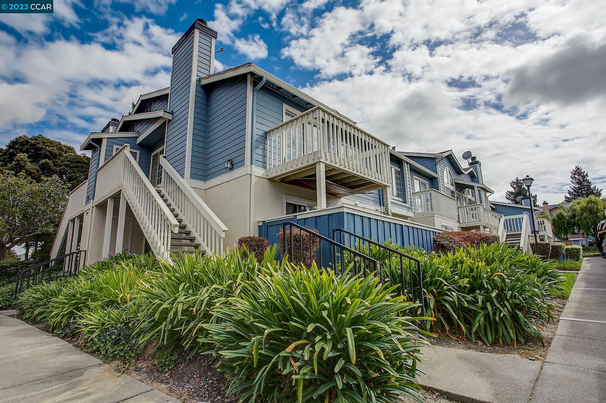 front view of a house with a small yard
