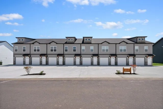 a view of a street with houses