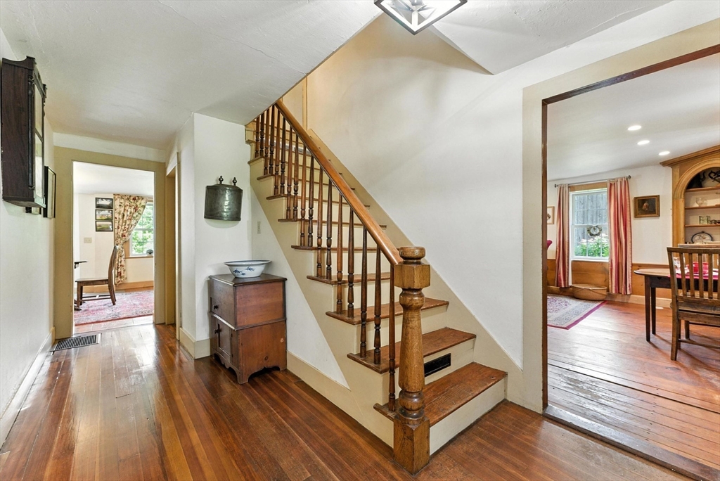 85 Dacey Road Conway, MA 01341 - Photo 11 of 42 a view of entryway and hall with wooden floor