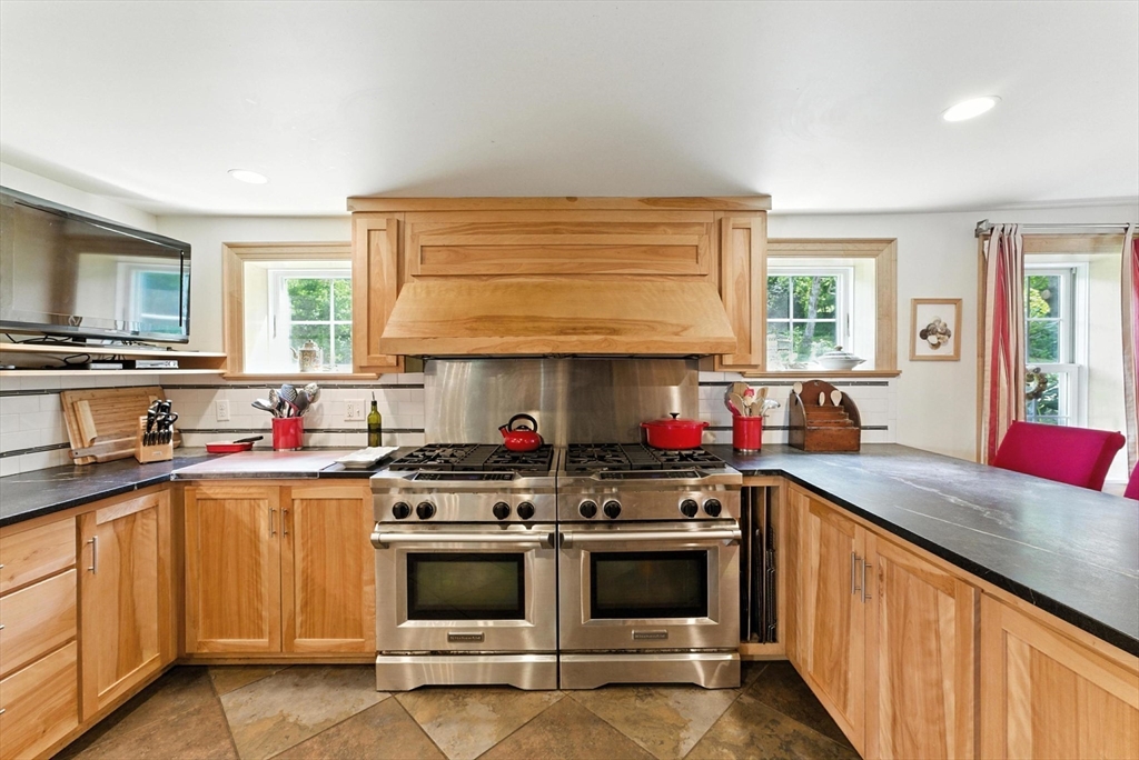 85 Dacey Road Conway, MA 01341 - Photo 13 of 42 a kitchen with a stove and a sink