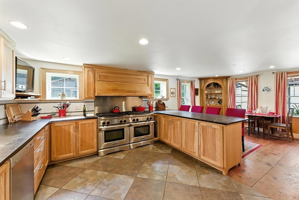85 Dacey Road Conway, MA 01341 - Photo 14 of 42 a kitchen with stainless steel appliances lots of counter top space