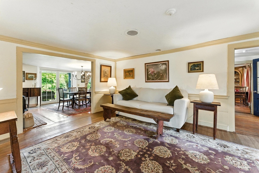 85 Dacey Road Conway, MA 01341 - Photo 24 of 42 a living room with furniture a rug and a table