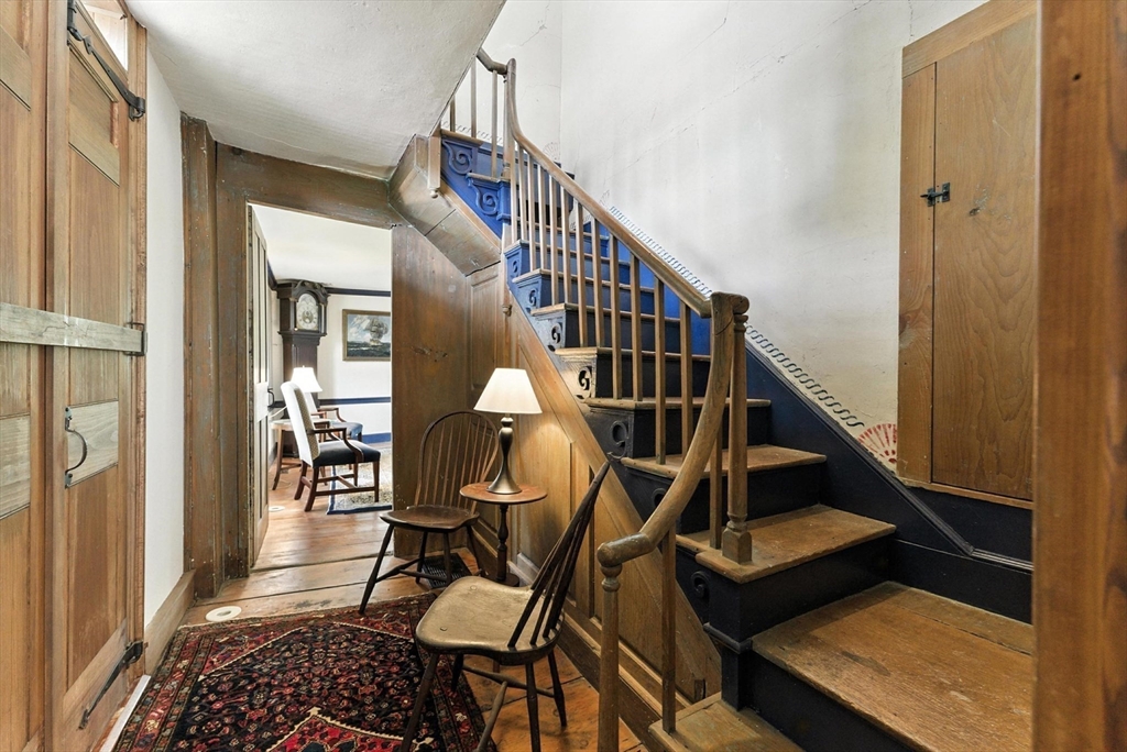 85 Dacey Road Conway, MA 01341 - Photo 25 of 42 a view of entryway dining room and hall with wooden floor