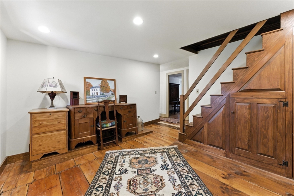 85 Dacey Road Conway, MA 01341 - Photo 29 of 42 a bed room with furniture and a rug