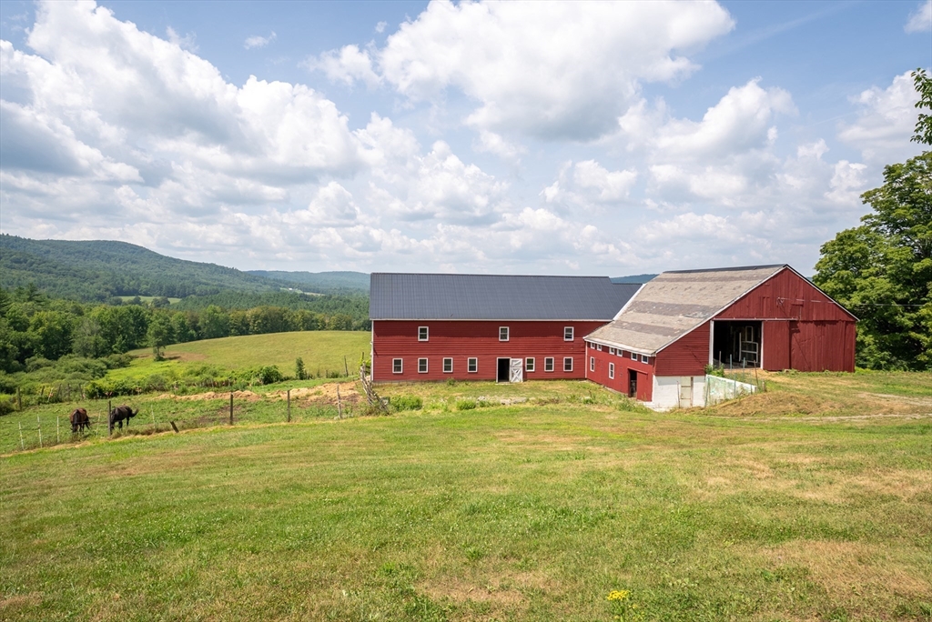 85 Dacey Road Conway, MA 01341 - Photo 3 of 42 a view of a house with a big yard