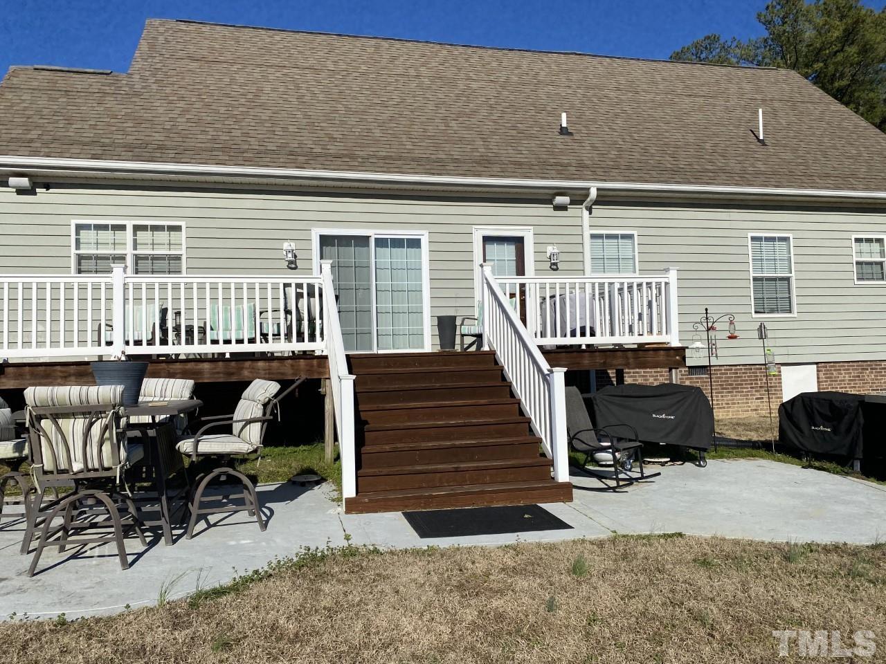 274 South Chaucer Way Kittrell, NC 27544 - Photo 25 of 28 front view of a house with a bench
