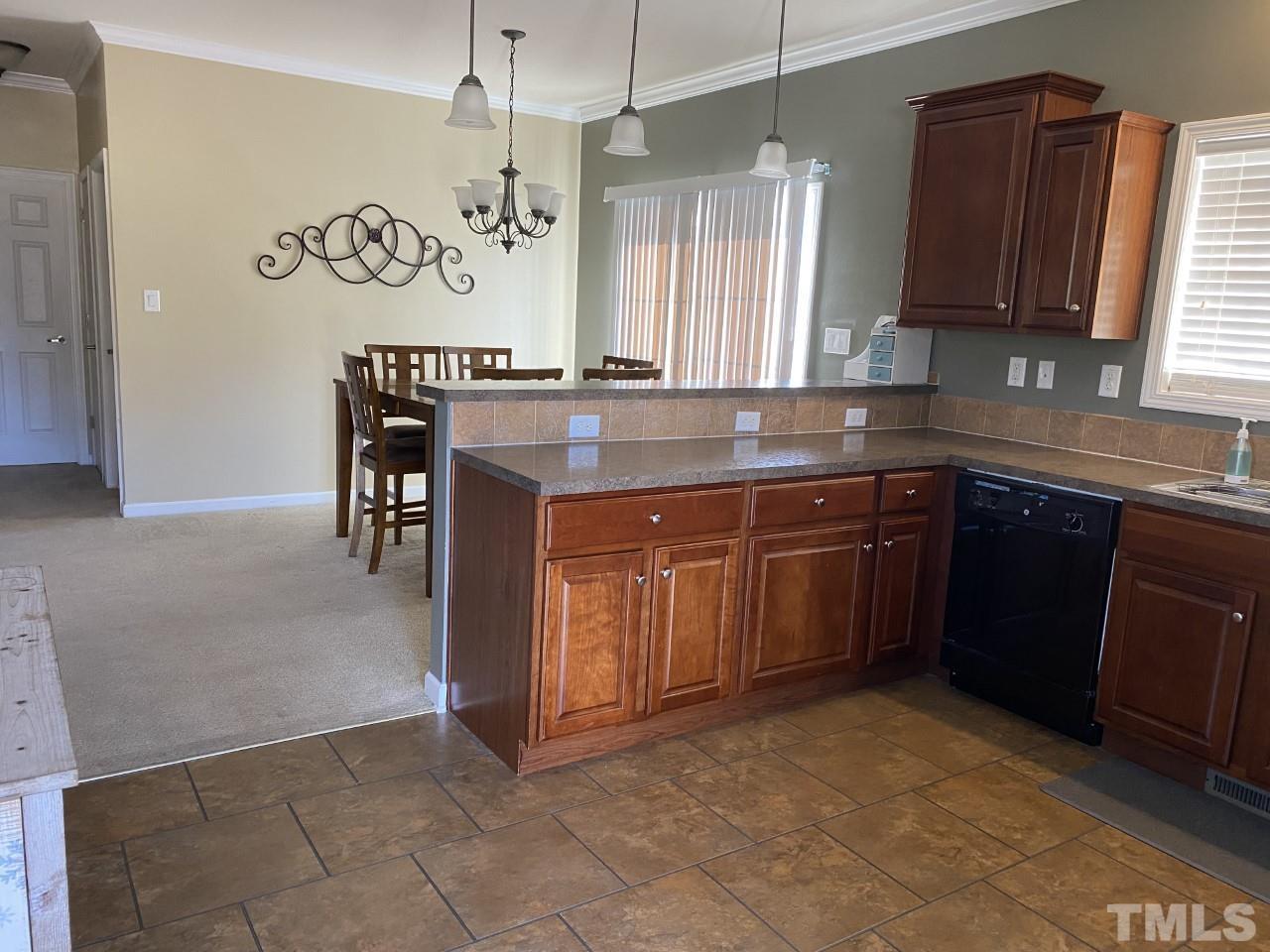 274 South Chaucer Way Kittrell, NC 27544 - Photo 5 of 28 a kitchen with a sink and cabinets