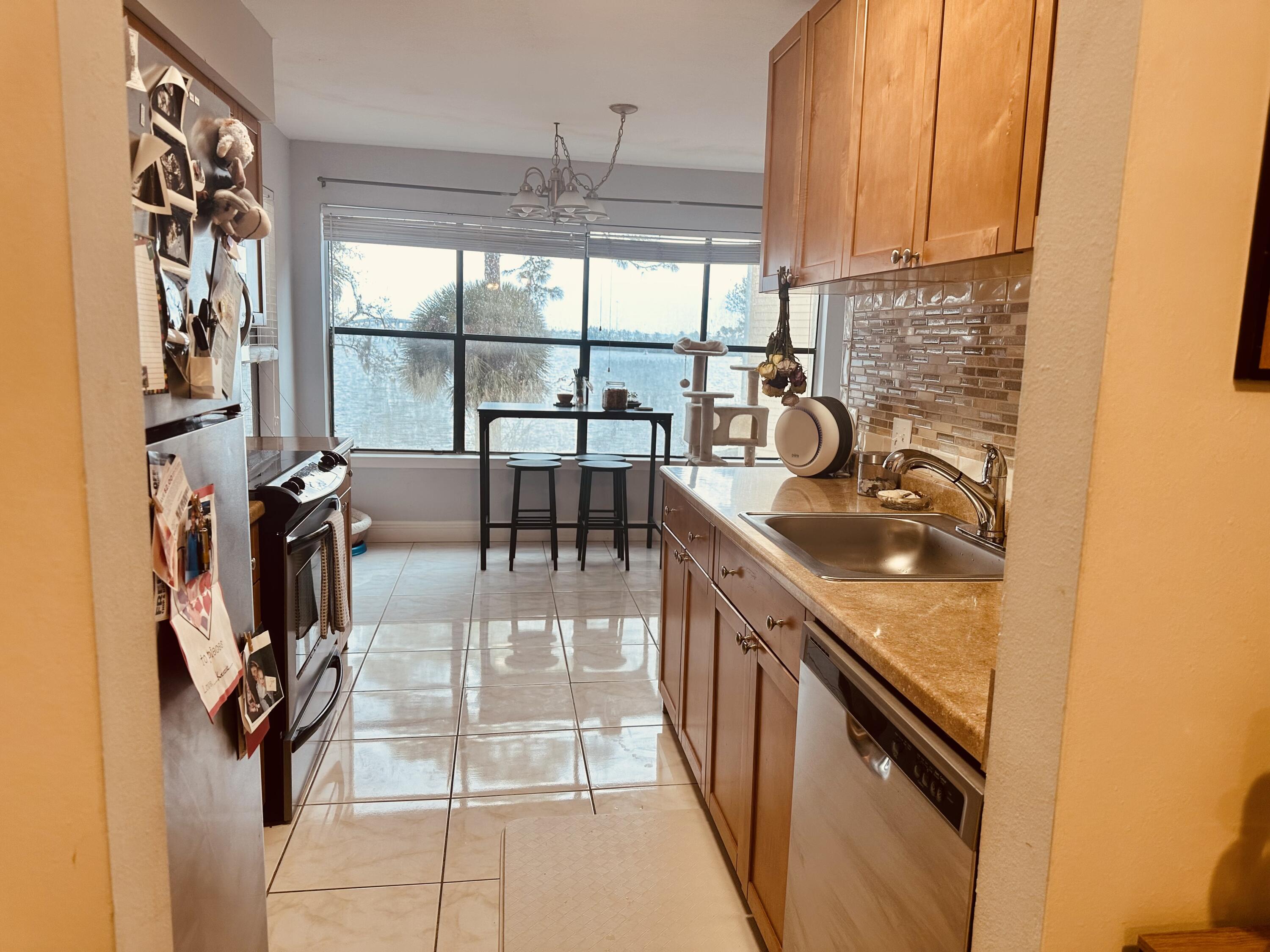 225 South Tropical Trail, Unit 320 Merritt Island, FL 32952 - Photo 2 of 60 IMG_2049