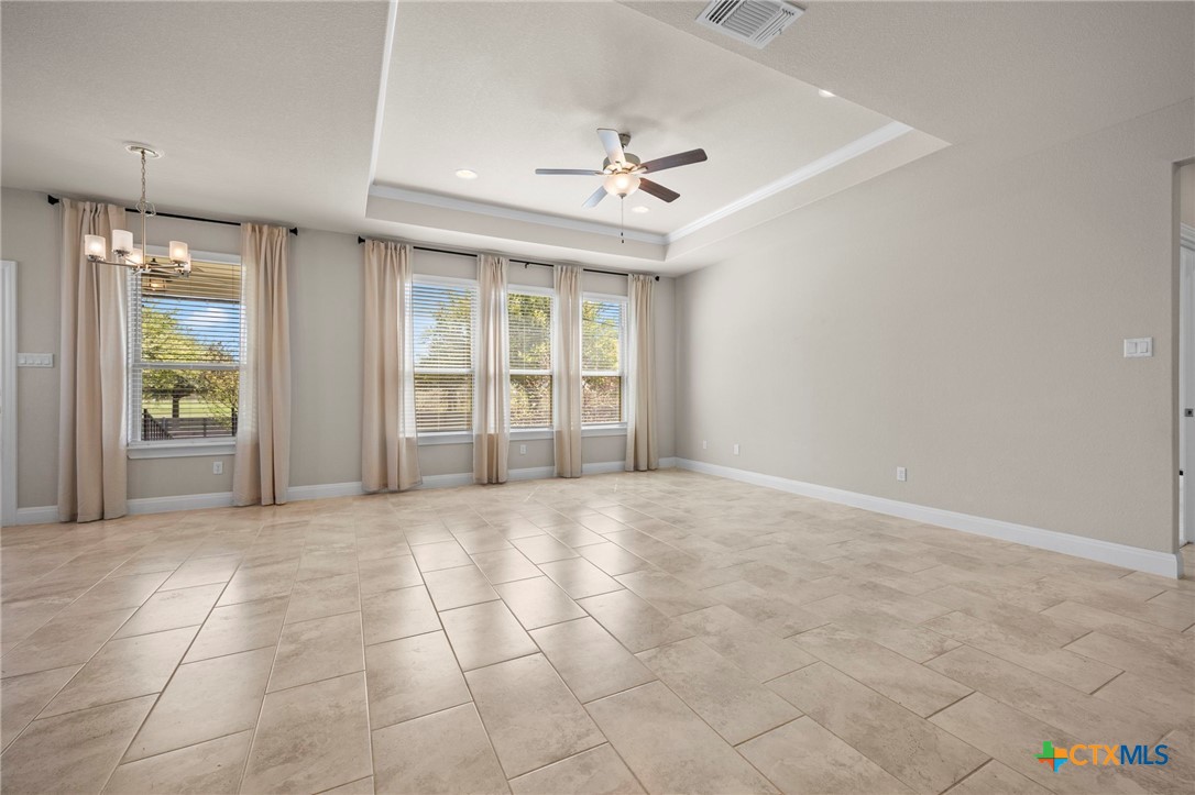 18215 Winnow Way Pflugerville, TX 78660 - Photo 13 of 21 a view of an empty room with a window
