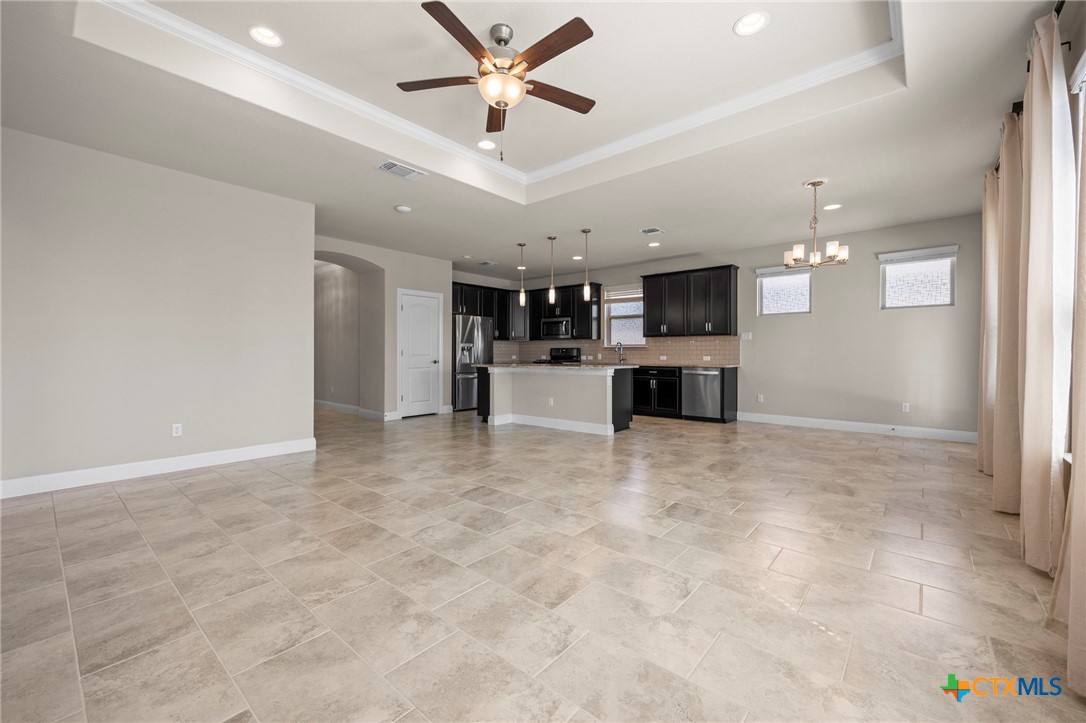 18215 Winnow Way Pflugerville, TX 78660 - Photo 14 of 21 a view of a kitchen with a sink and cabinets