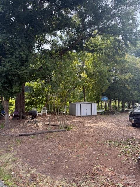703 South Main Street Morganton, NC 28655 - Photo 5 of 6 a view of a outdoor space with large trees
